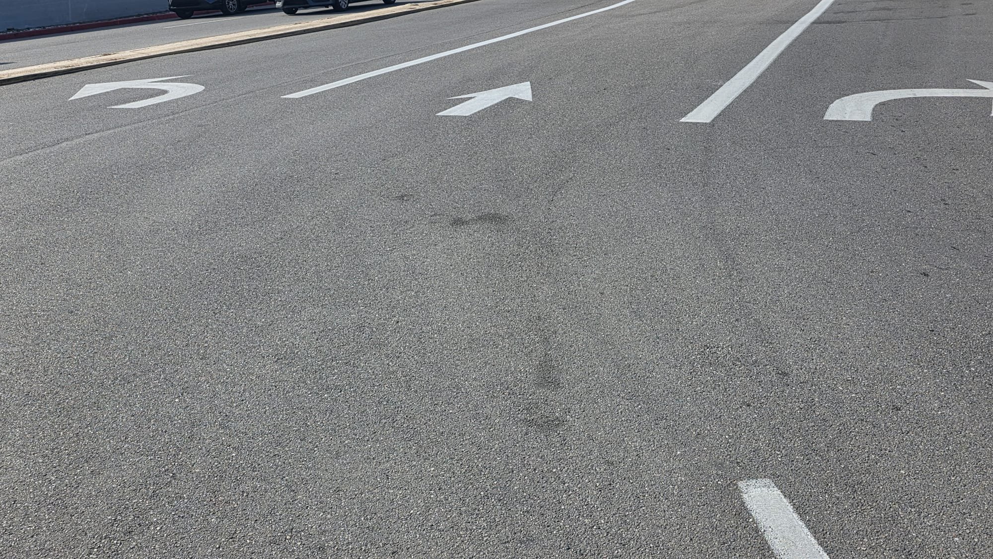 Before photo of commercial directional markings